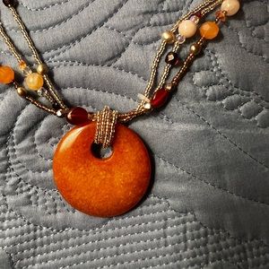 Amber colored stone necklace